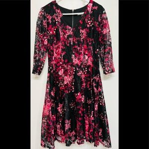 A short Dress. Black red and pink print, Medium in size